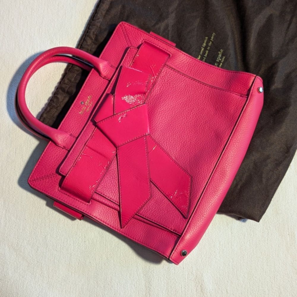 Kate Spade New York pink medium leather tote with patent bow statement